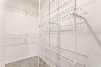 Empty white shelving unit in a room